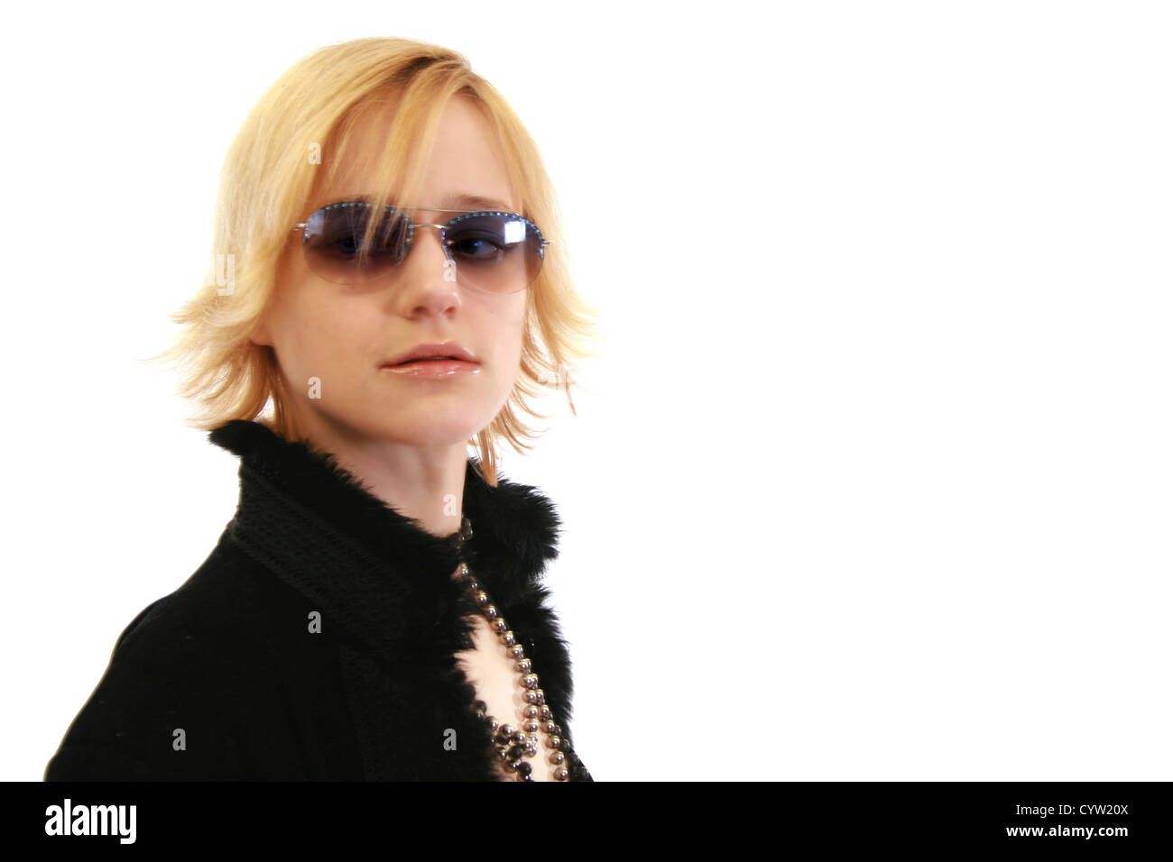 Blonde woman in sunglasses and a furry coat with copy space Stock Photo ...