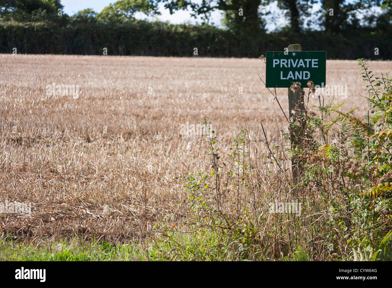 Private Land sign at edge of field Stock Photo