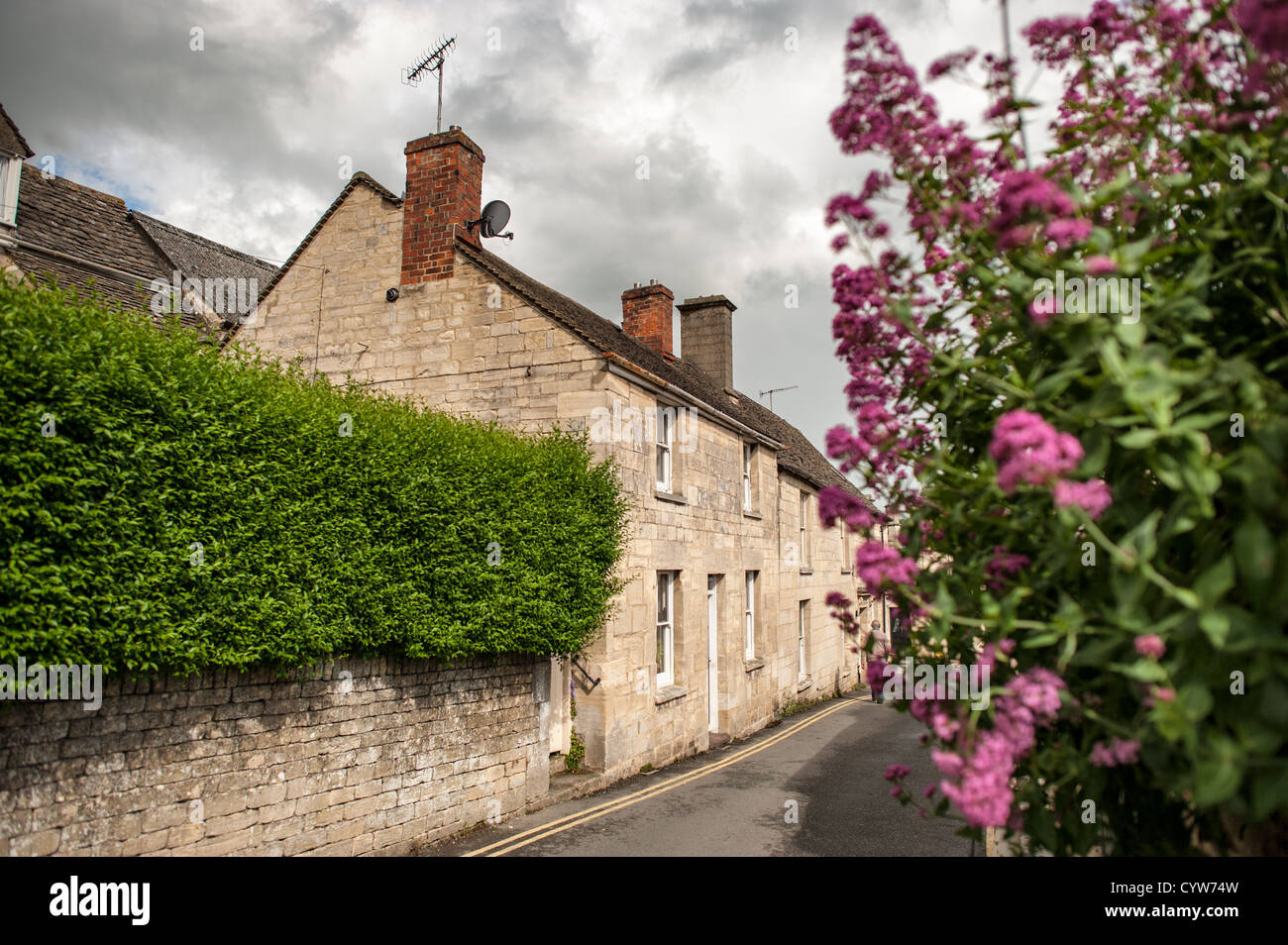 PAINSWICK, UK A street in the village of Painswick in the Stock Photo