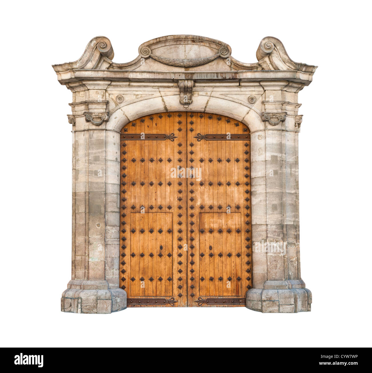 Wooden double doors with iron details. Beautiful stone arch designed in gothic style. Massive doorway isolated on white Stock Photo