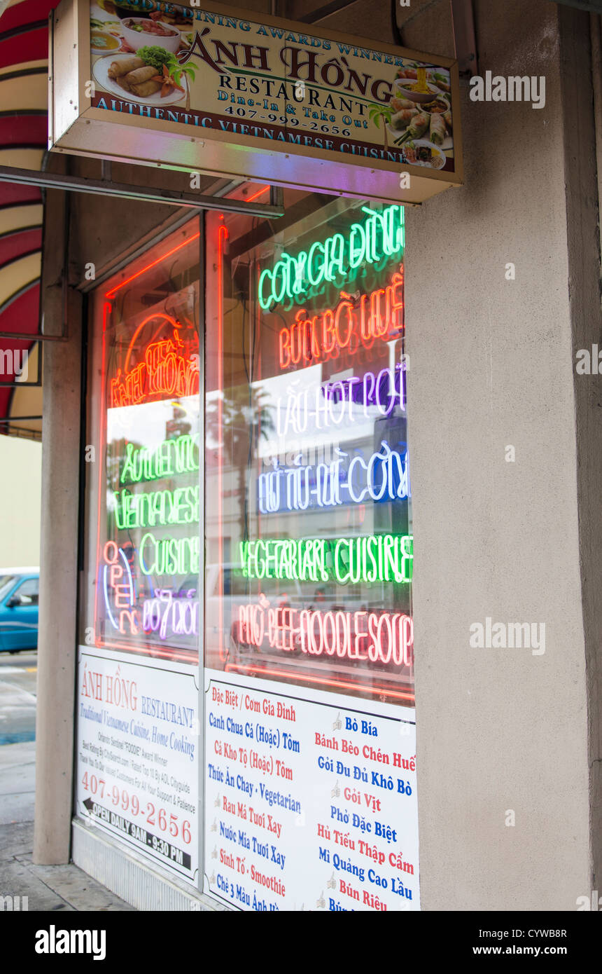 Neon menu in window of NH Hong Vietnamese restaurant in Little Vietnam district of Orlando, Florida. Stock Photo