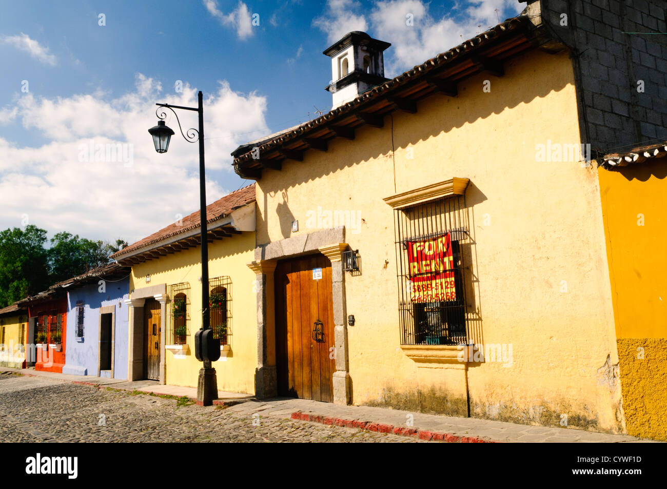 Houses on one of the cobblestone streets in Antigua, Guatemala Stock