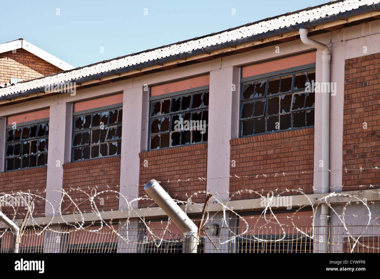 Broken windows of the ex boarding school dormitories in Prieska Stock Photo