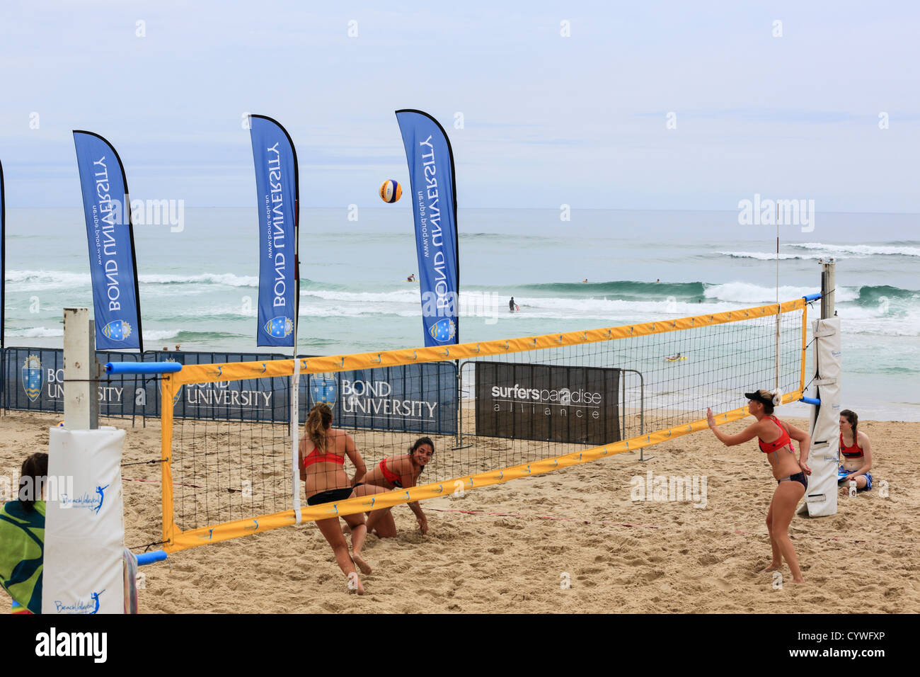Beach volleyball at Surfers Paradise on an overcast and rainy day Stock