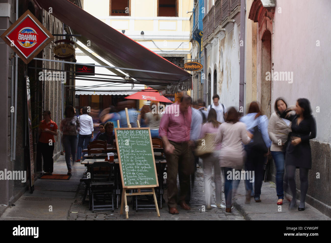 People walking past restaurants on Travessa do Comercio, Centro, Rio de Janeiro, Brazil Stock Photo