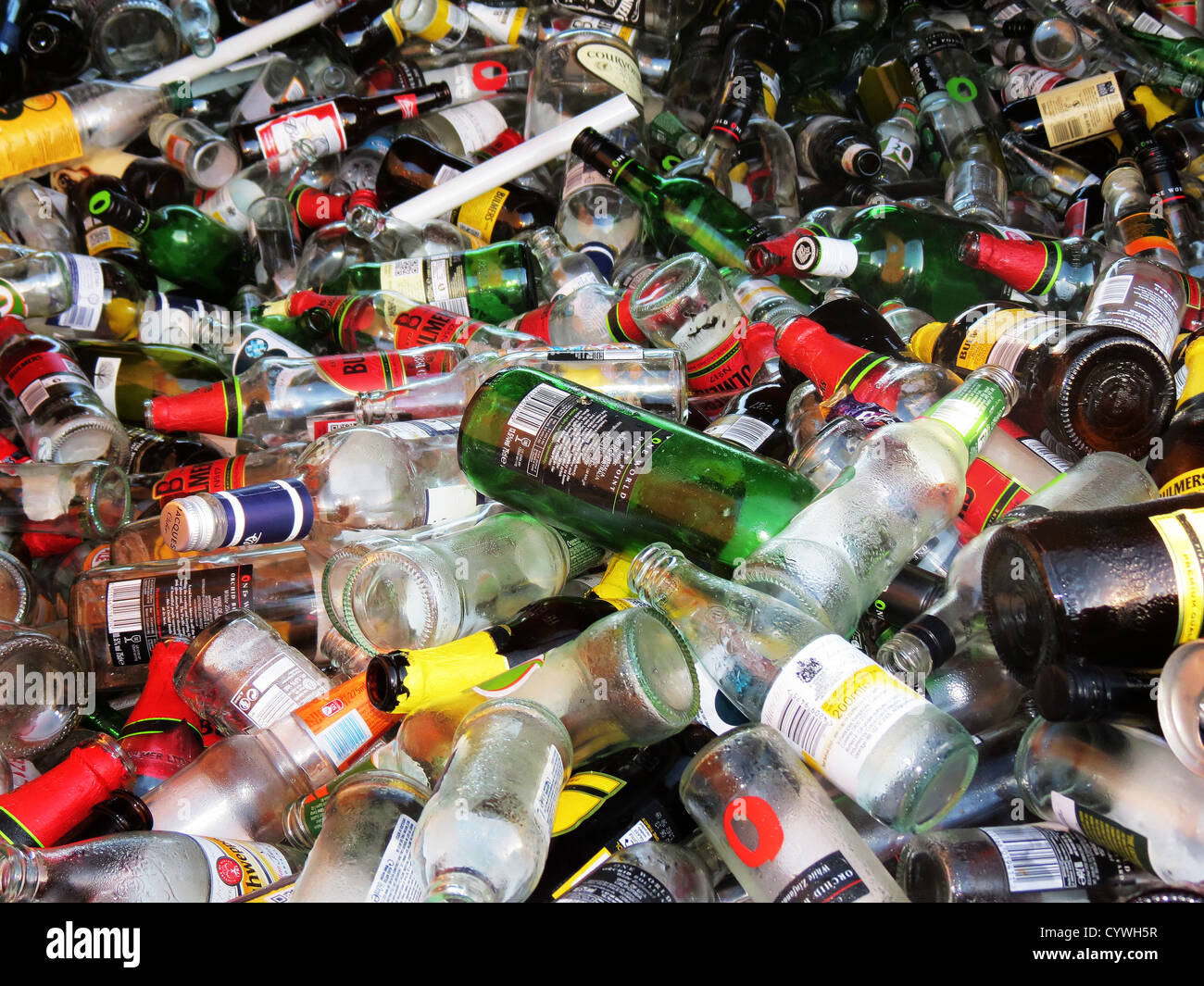 Waste glass and bottles in skip Stock Photo Alamy