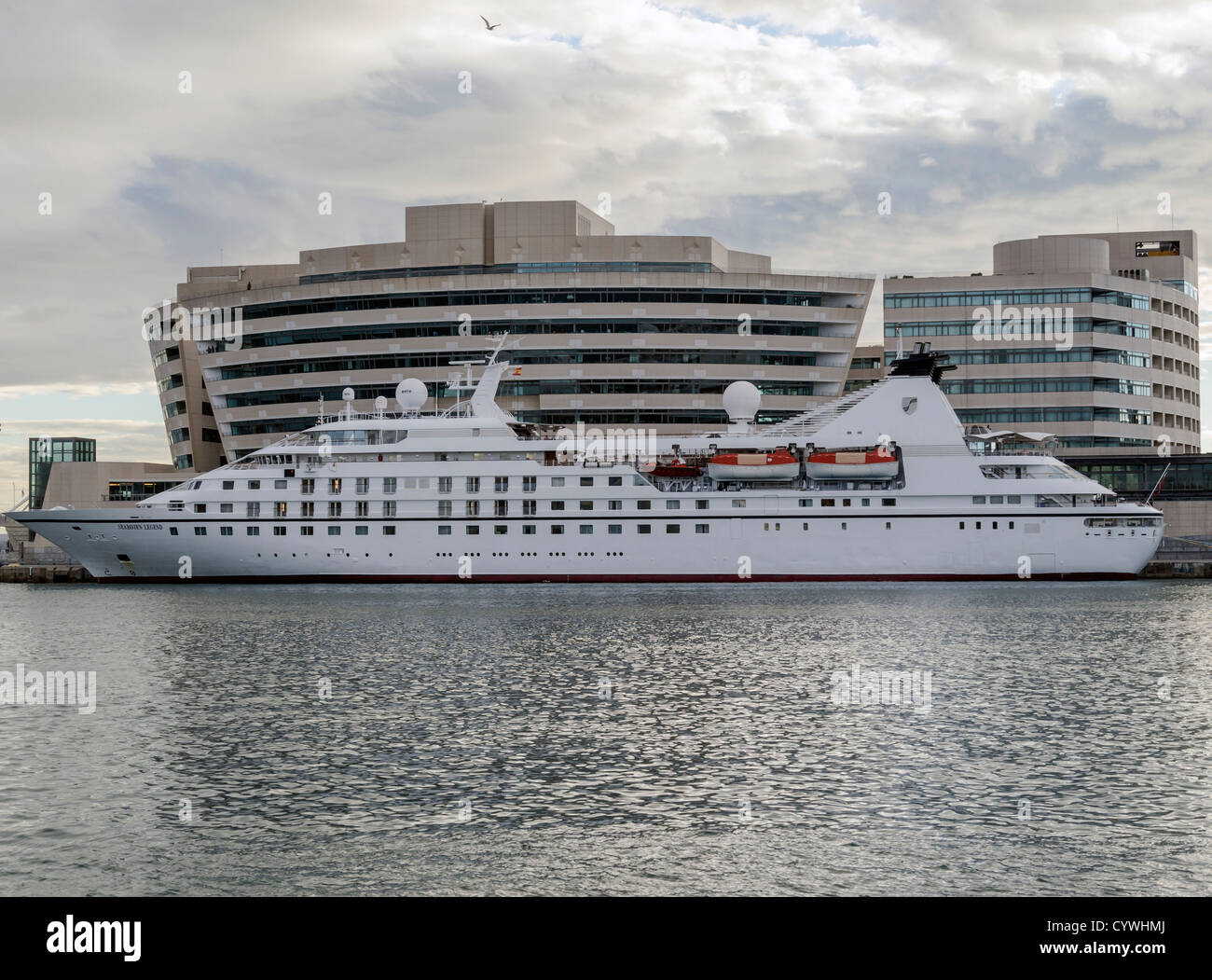 A ship in front WTCB (world trade center barcelona) in port vell,Barcelona Stock Photo