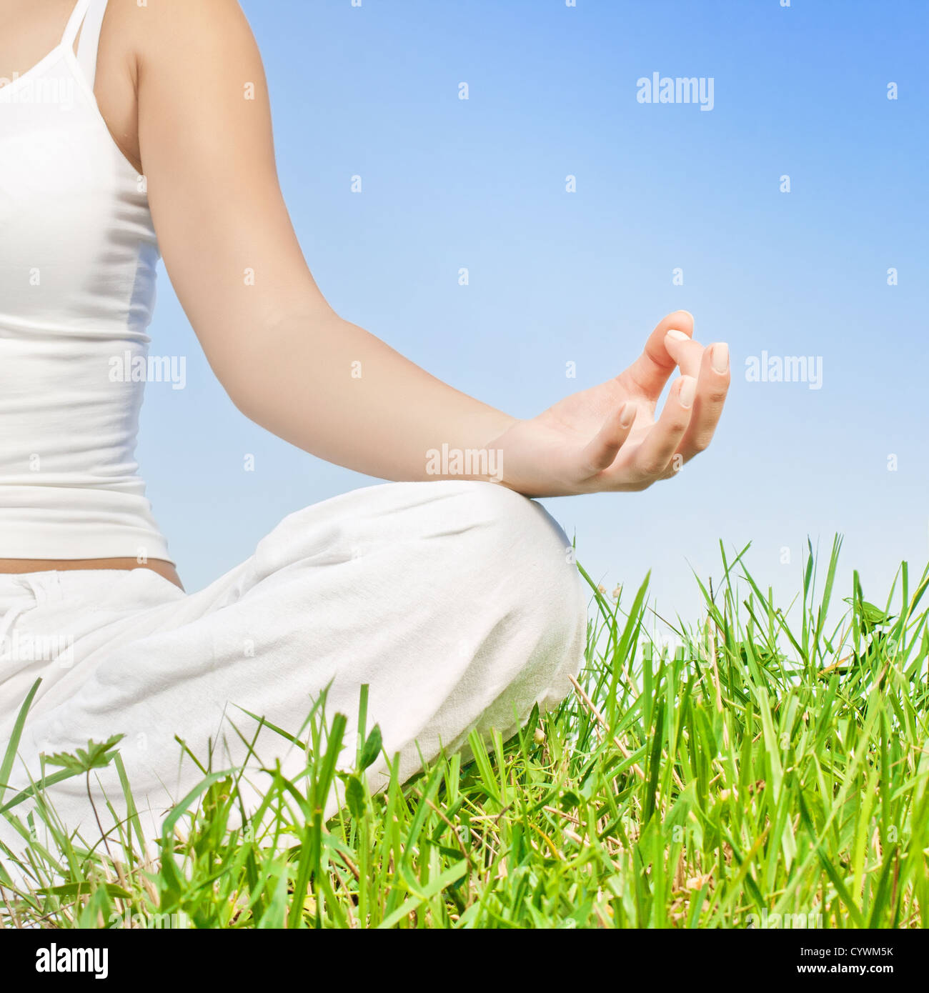Closeup of woman hands in yoga meditation pose outdoors Stock Photo - Alamy
