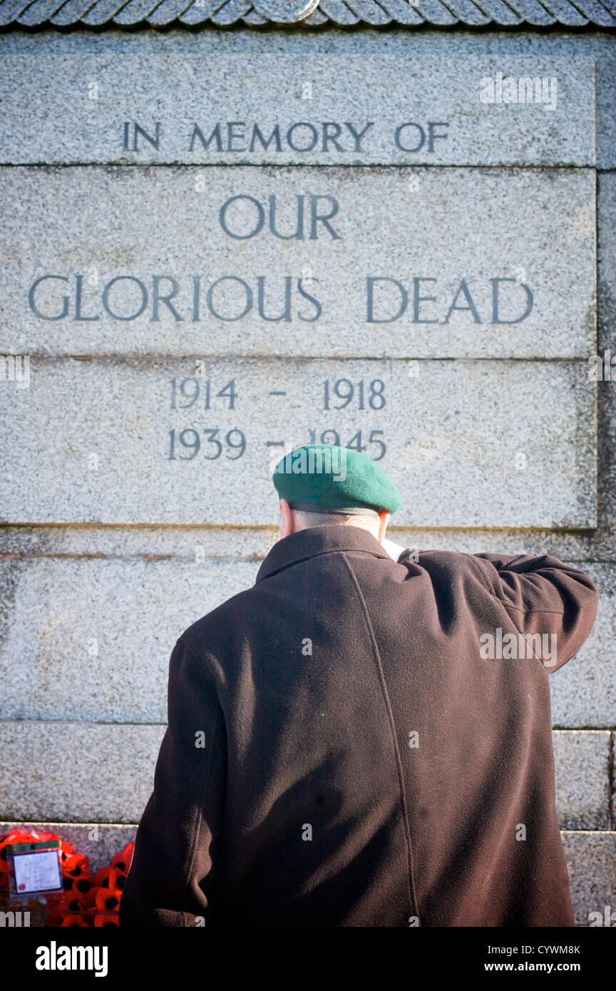 Blackpool,UK  11th November 2012.  Remembrance service held at Blackpool cenotaph on the seafront next to north pier. An old soldier salutes his fallen comrades. Alamy Live News Stock Photo