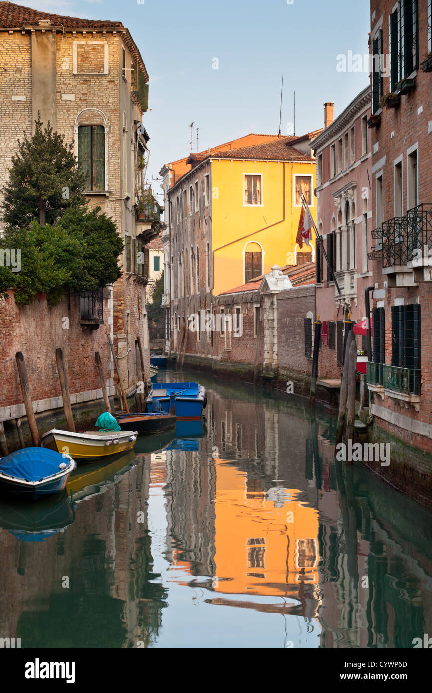 Venetian Canal. Reflections are on the water Stock Photo - Alamy