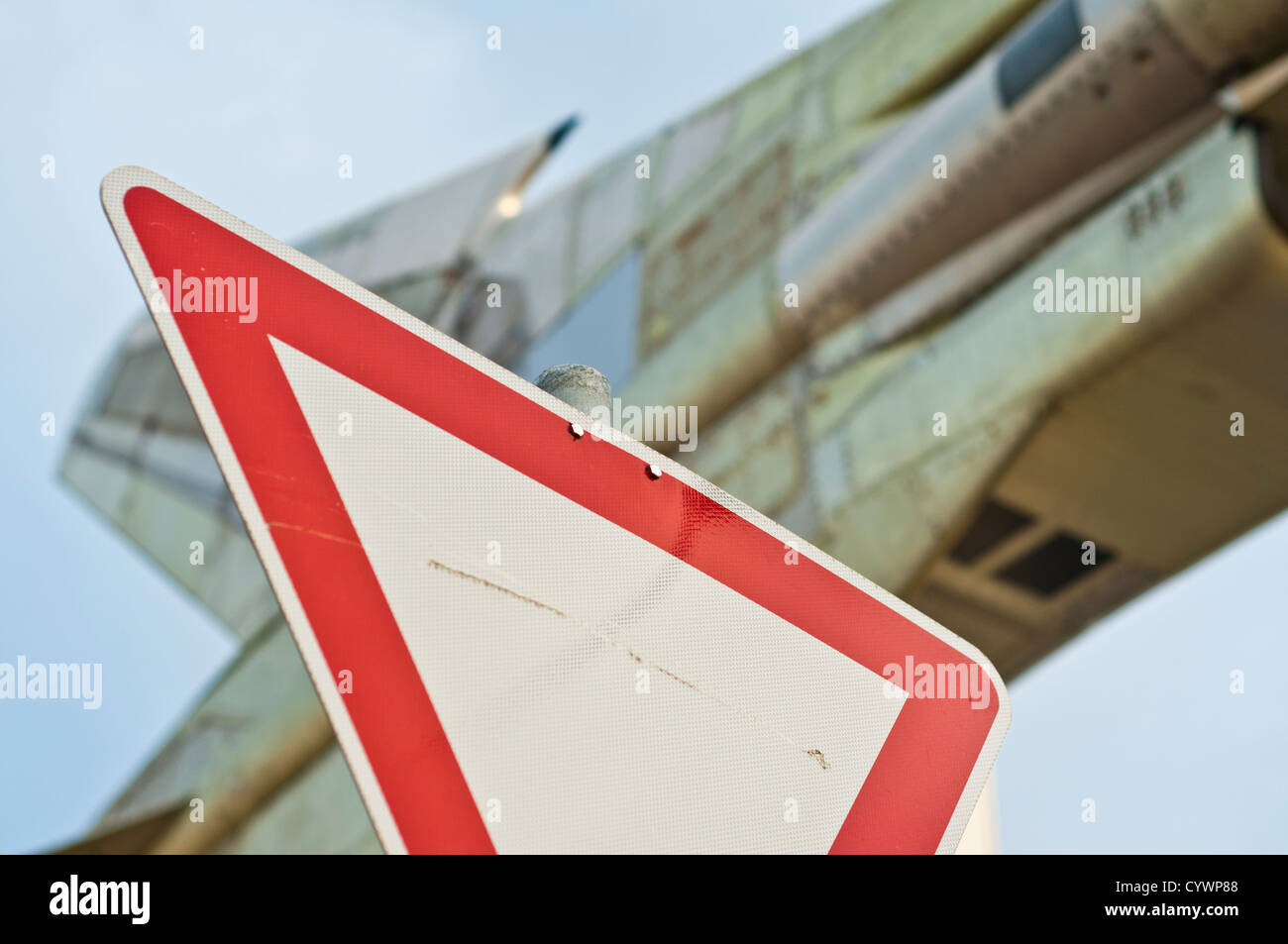 Russian fighter bomber jet aircraft MIG-23 ML behind a Give Way road sign -  Car & Technology Museum Sinsheim, South Germany Stock Photo - Alamy