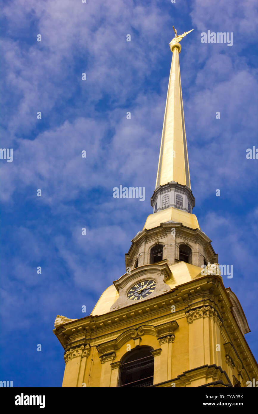 The spire of the Peter and Paul Fortress (Petropavlovsky Cathedral) piercing blue sky, St. Petersburg, Russia Stock Photo