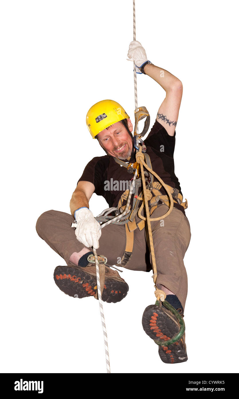 Man practicing Single Rope Technique SRT of ascending a rope for caving and climbing sport, UK Stock Photo