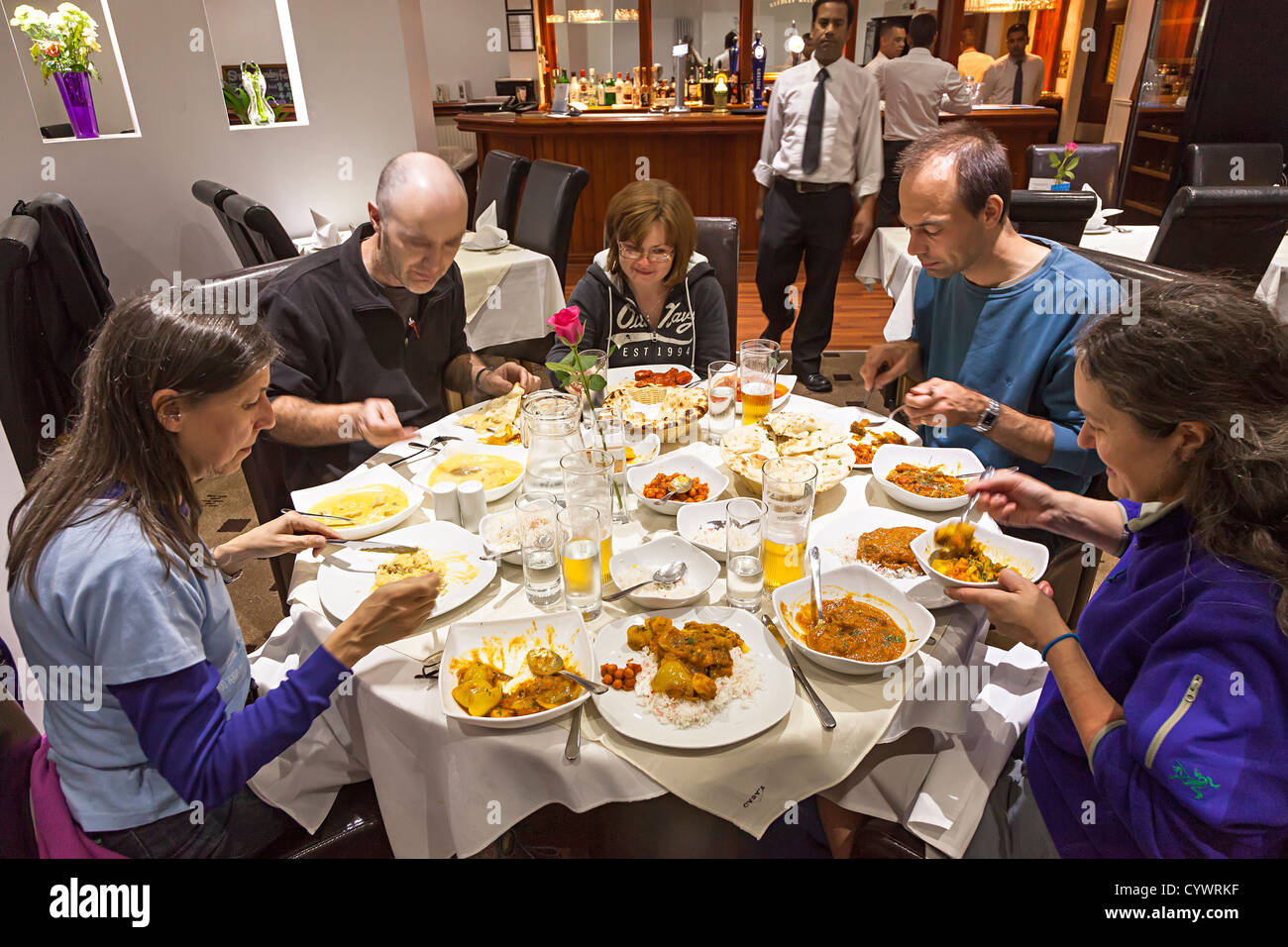 Group of people eating curry in an Indian restaurant, Burnley, England, UK Stock Photo Alamy