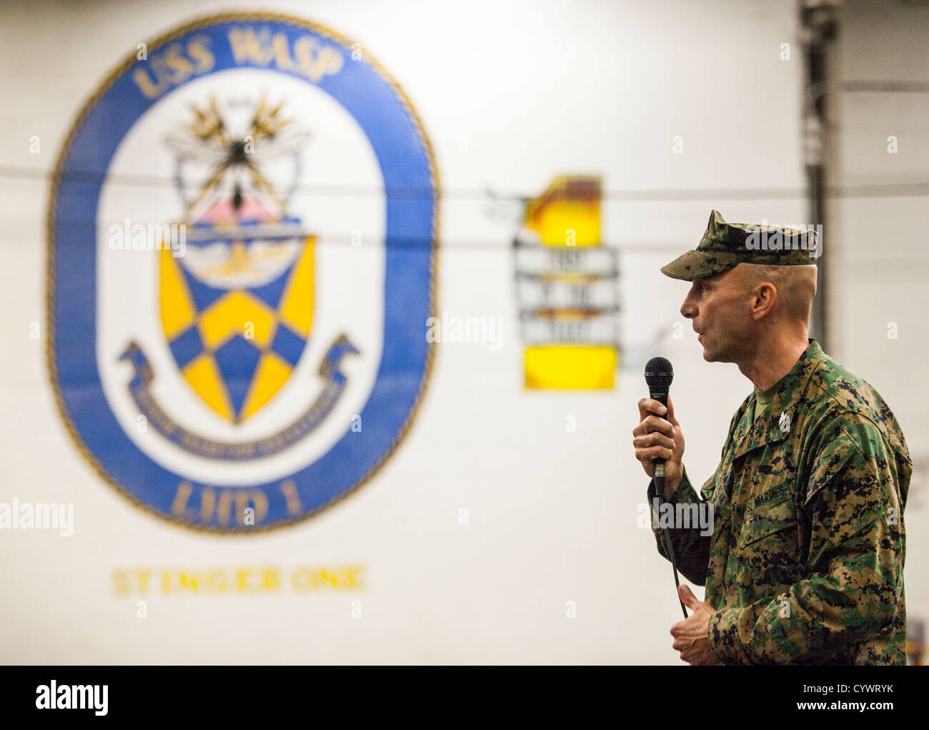 Col. Matthew St. Clair, 26th Marine Expeditionary Unit commanding officer, speaks to the Marines and sailors assigned to the 26t Stock Photo