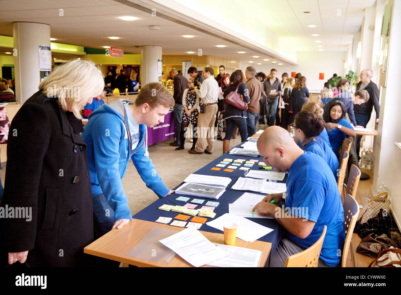 A student and parent attending Brighton University Open day for prospective students admission, Brighton UK Stock Photo