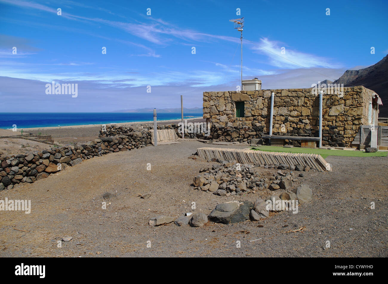 A stone cottage at the Atlantic Ocean on October 24, 2011 in Cofete, Fuerteventura Island, Spain Stock Photo