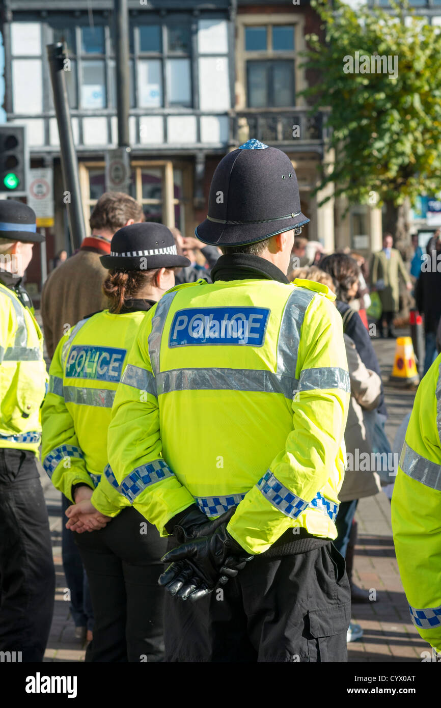 UK Police officers wearing high viz jackets on duty Stock Photo