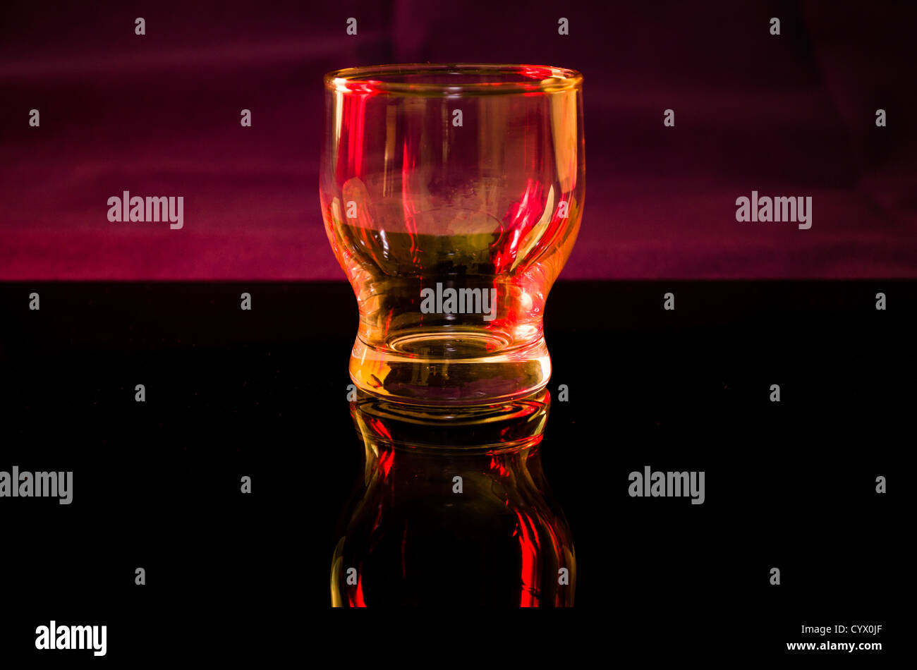 Refractions of colour in a glass. Stock Photo