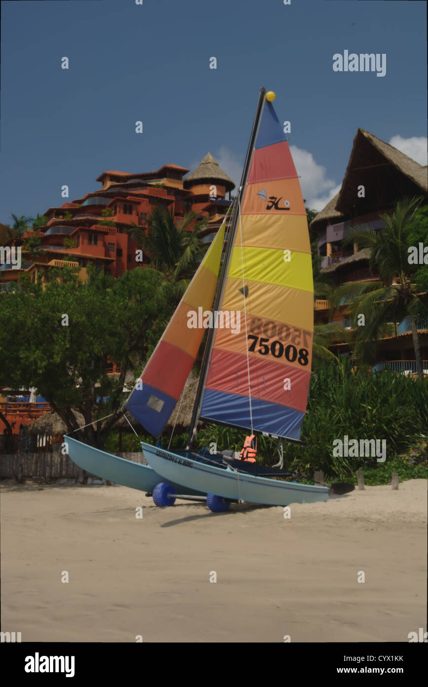 Hobbie sailing craft moored on the beach in Zihuatanejo Stock Photo Alamy