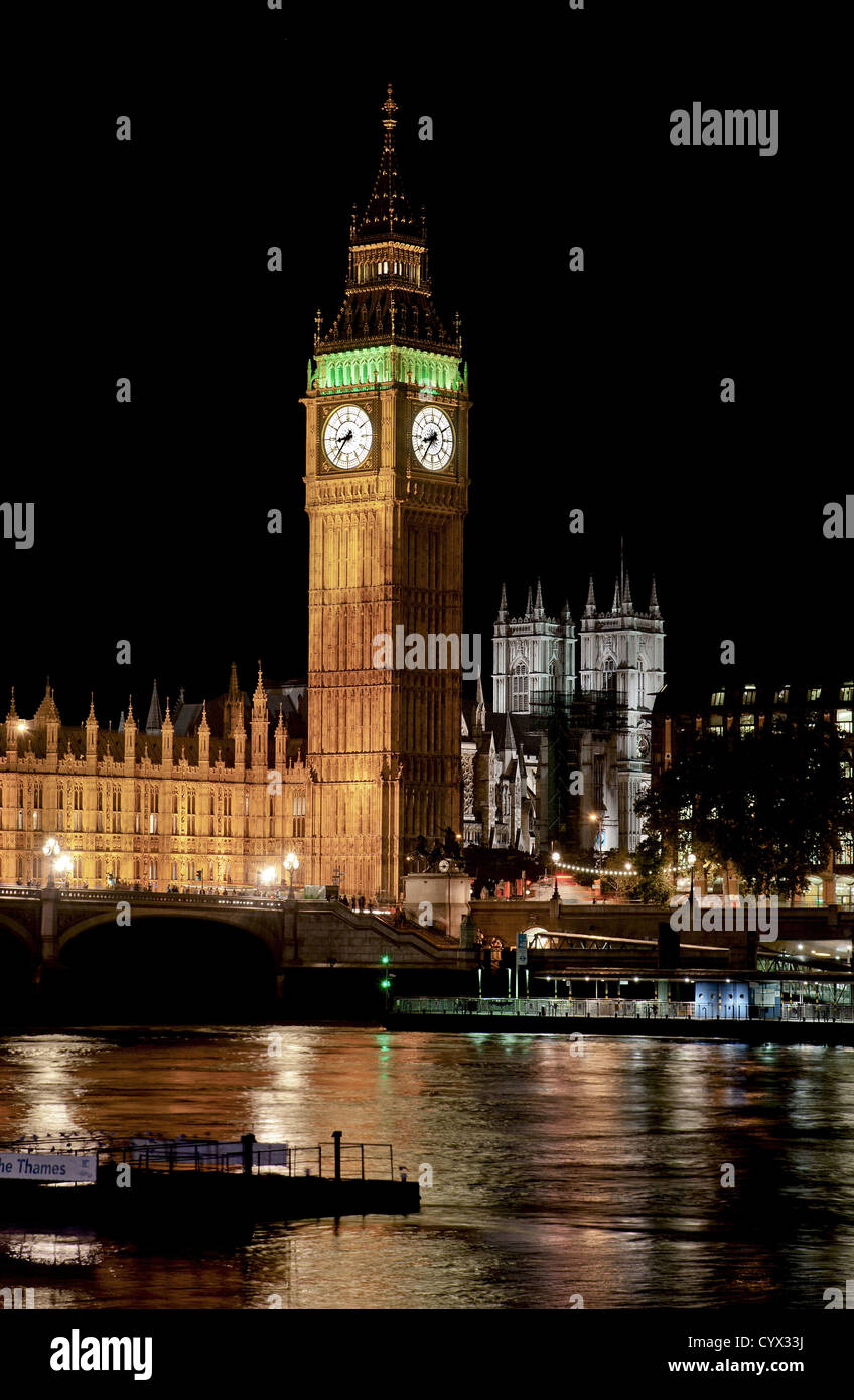 Big Ben and Parliament at night taken across the Thames River in London, Great Britain. Stock Photo