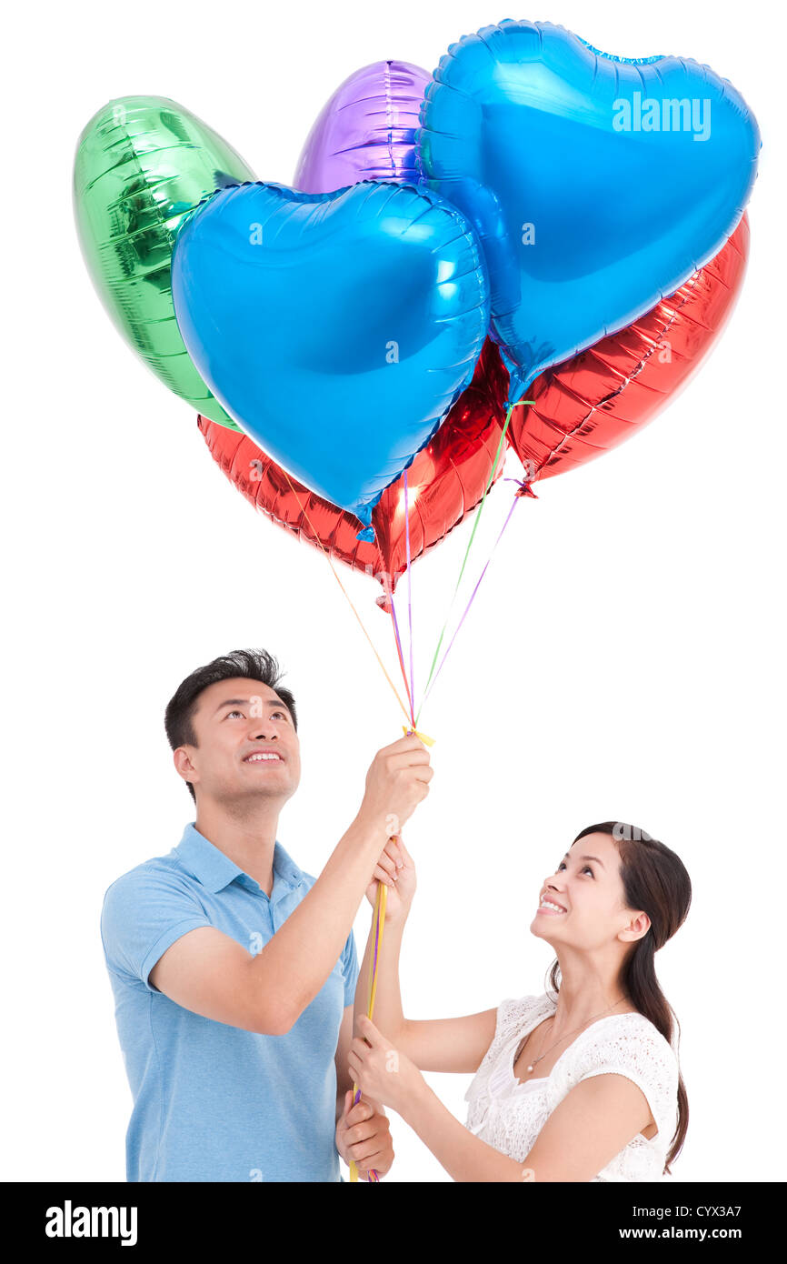Couple heart shape balloons hi-res stock photography and images - Alamy