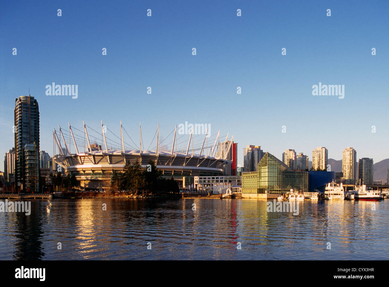 Vancouver Downtown City Skyline, British Columbia, Canada - BC Place Stadium and High Rise Buildings at False Creek Stock Photo