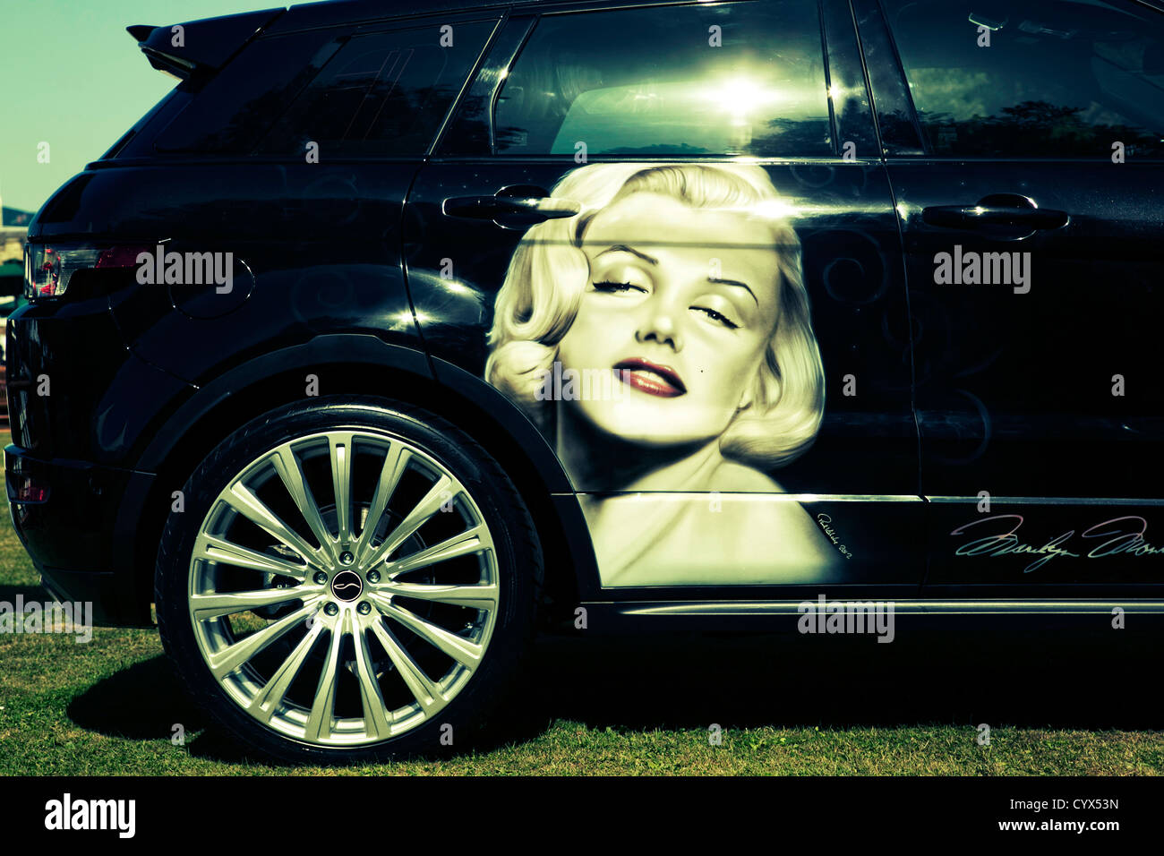 Custom Range Rover Evoque with Marilyn Monroe portrait painting on the rear door Stock Photo