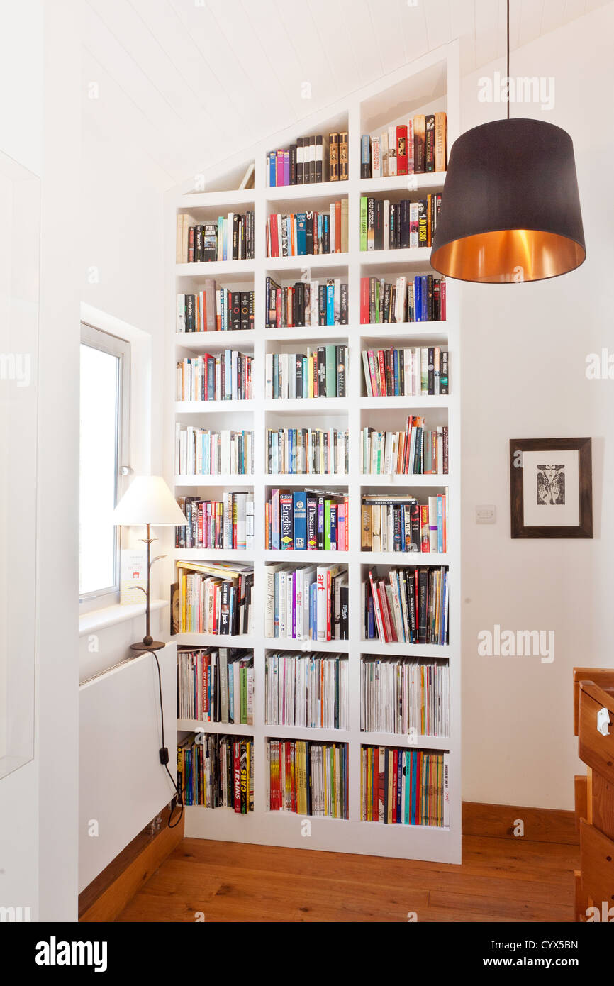 Landing and bookcase in modern home Stock Photo