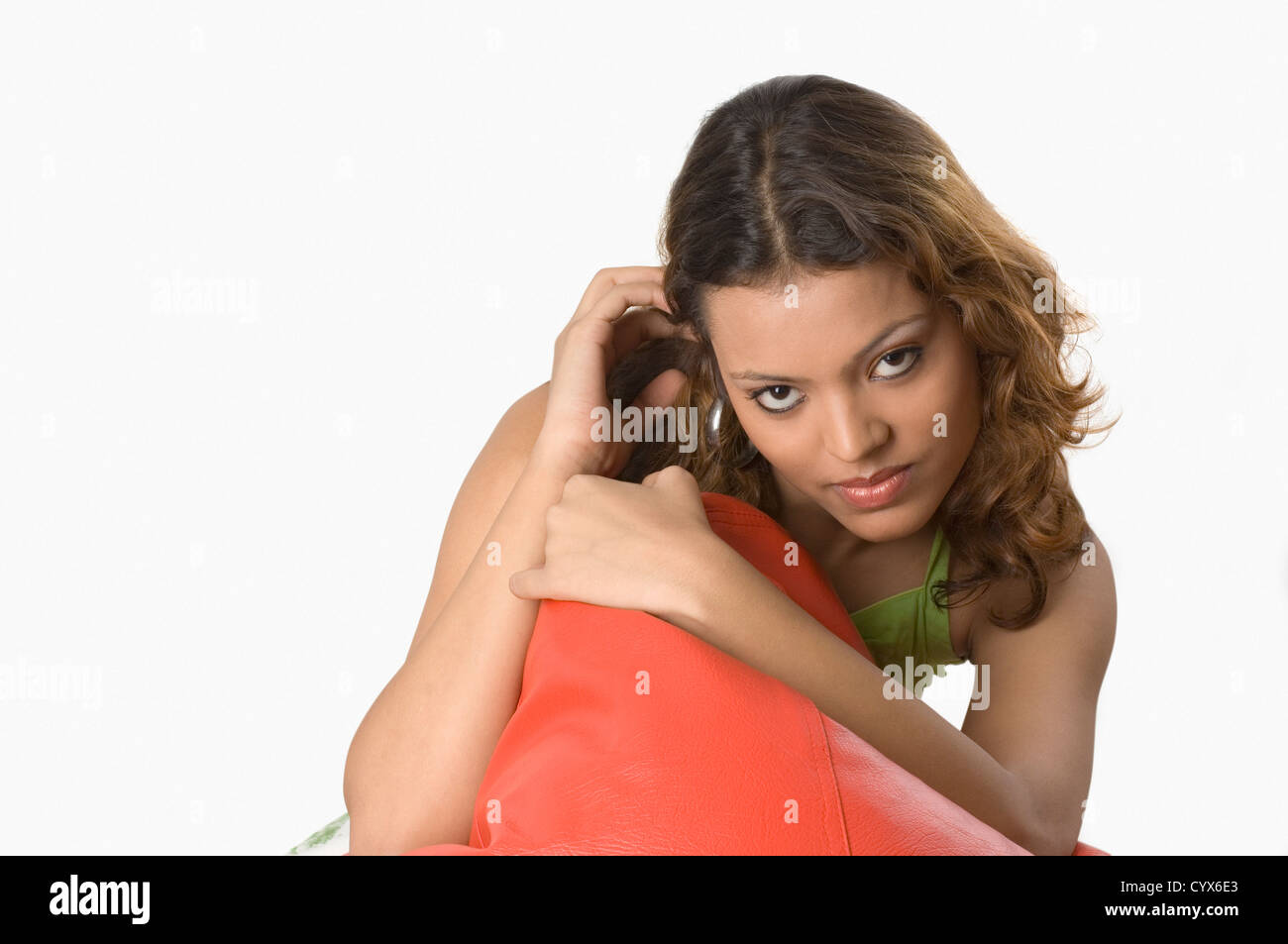 Portrait of a woman holding bean bag Stock Photo - Alamy