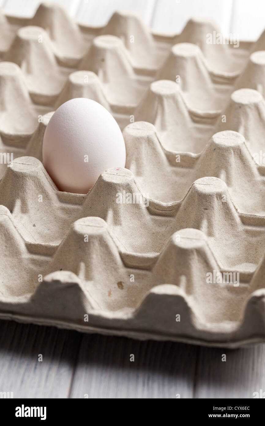 the white egg in carton Stock Photo - Alamy