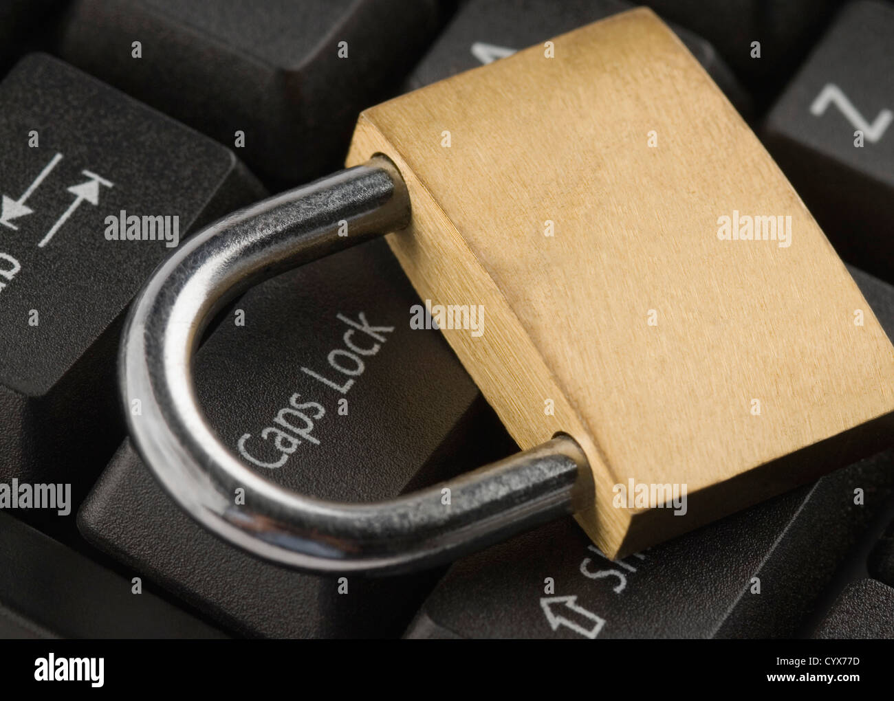 Padlock on a computer keyboard Stock Photo Alamy