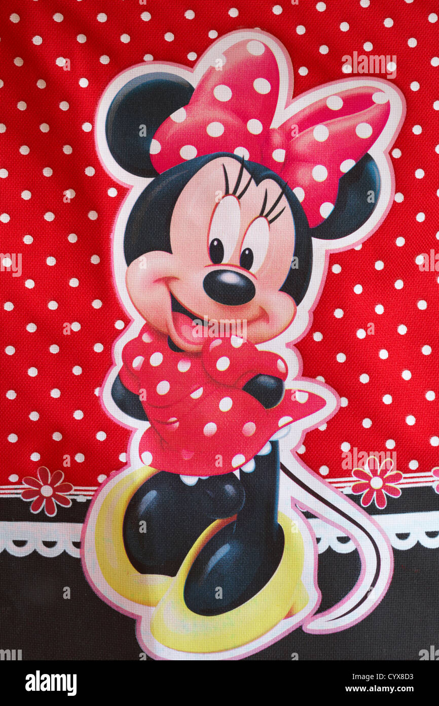 Detail of Minnie Mouse on colourful red polka dot shopping bag Stock Photo