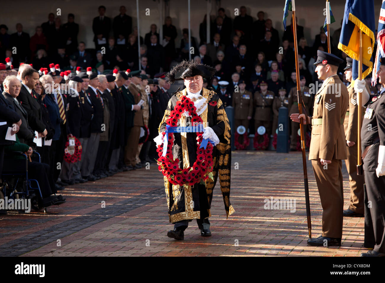 The Remembrance service in Millennium Square, Birmingham, UK. The Lord Mayor of Birmingham Cllr John Lines lays the first wreath Stock Photo