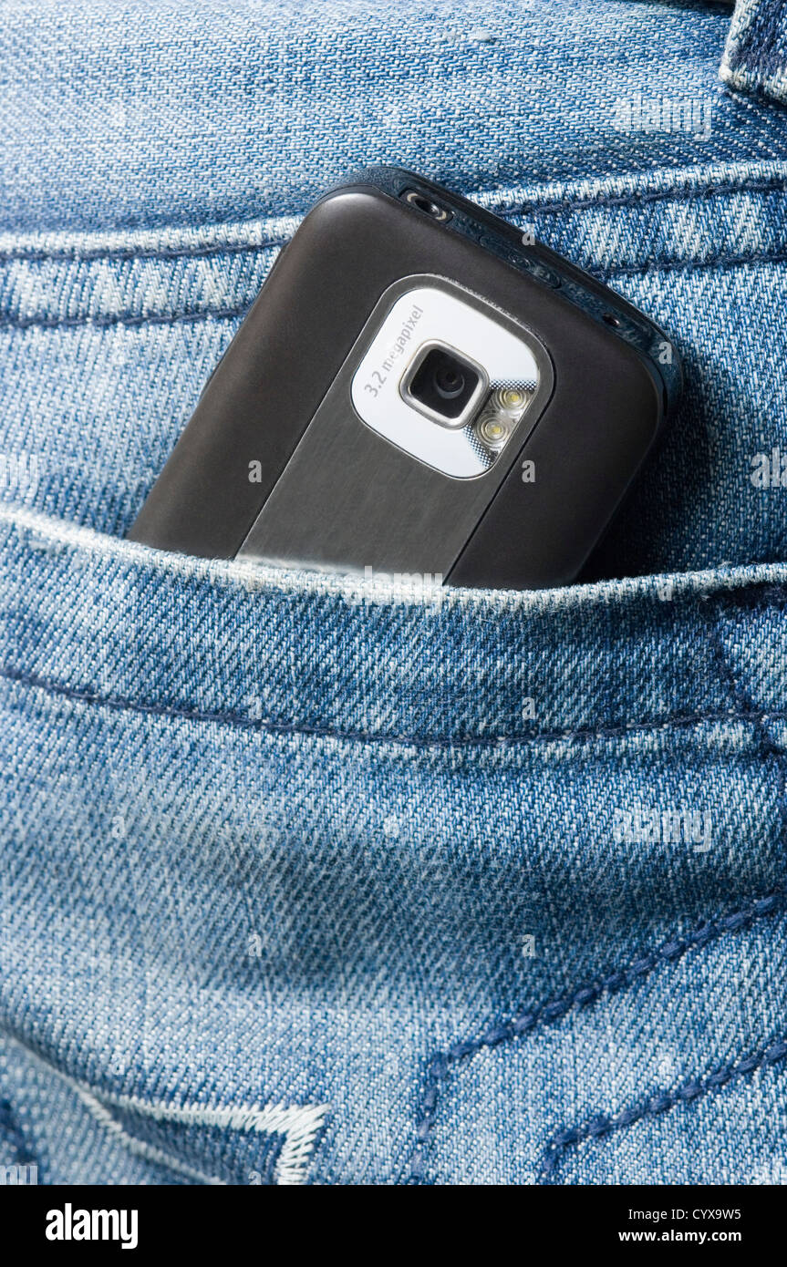 Mobile phone in a jeans pocket Stock Photo Alamy
