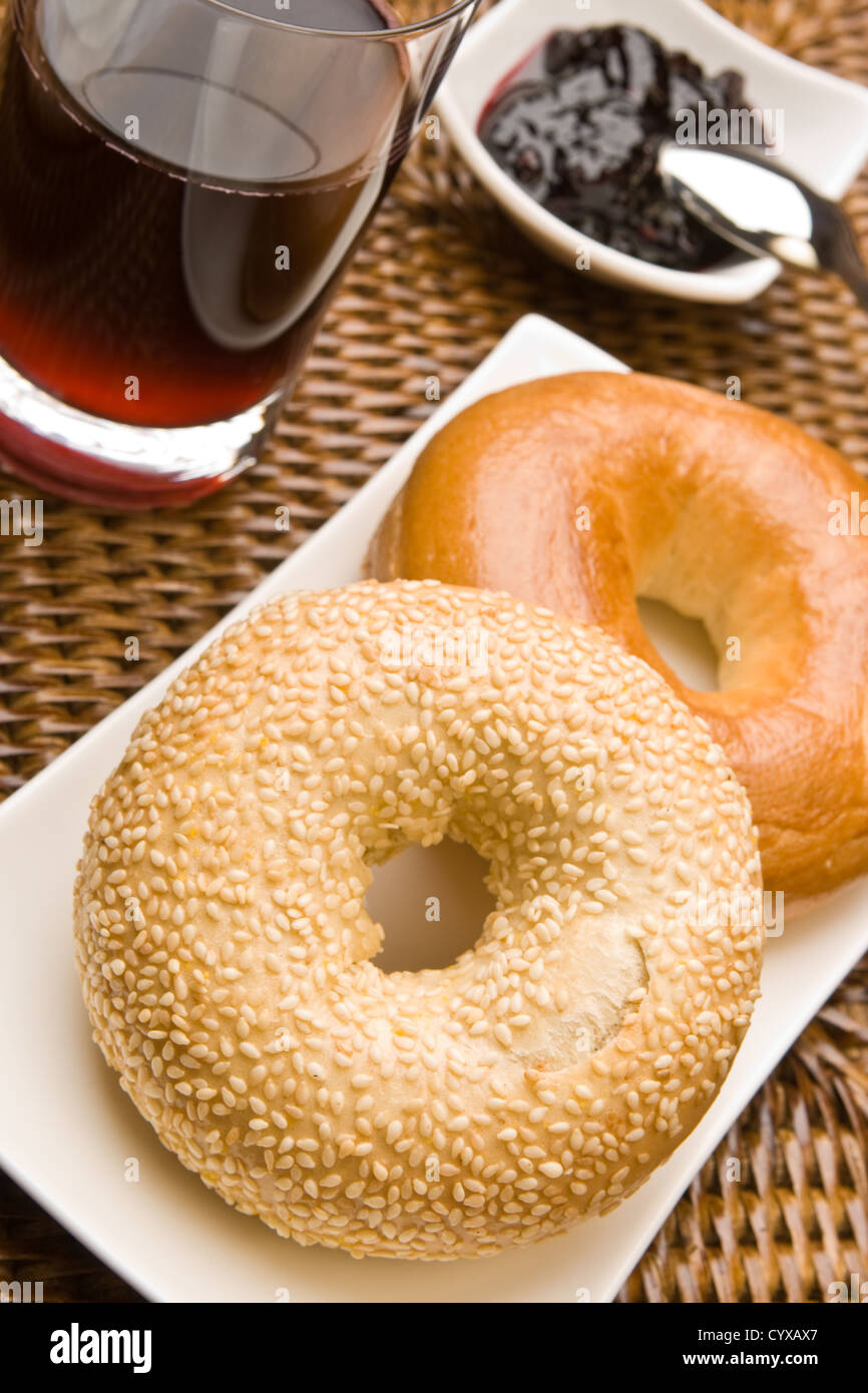 Fresh bagels with jam and blackcurrant juice Stock Photo Alamy