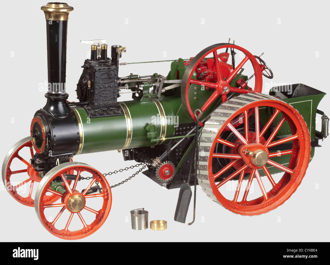 A well emgineered 1.5in scale model of a BURRELL 'DEVONSHIRE',single crank compound two speed three shaft general purpose traction engine. With braised copper boiler with normal fittings,two cylinders 0.5in and 7/8th in bores x 1.25in stroke,LP cylinder draincocks and pipes,mechanical lubricator,Stephenson's link reverse,eccentric driven feed pump and bypass,two road speeds and spoked flywheel. Chassis details include spoked,straked wheels,chain steering,damper,band brake to rear axle and many other details,finished in green,red and black with whit,Additional-Rights-Clearences-Not Available Stock Photo