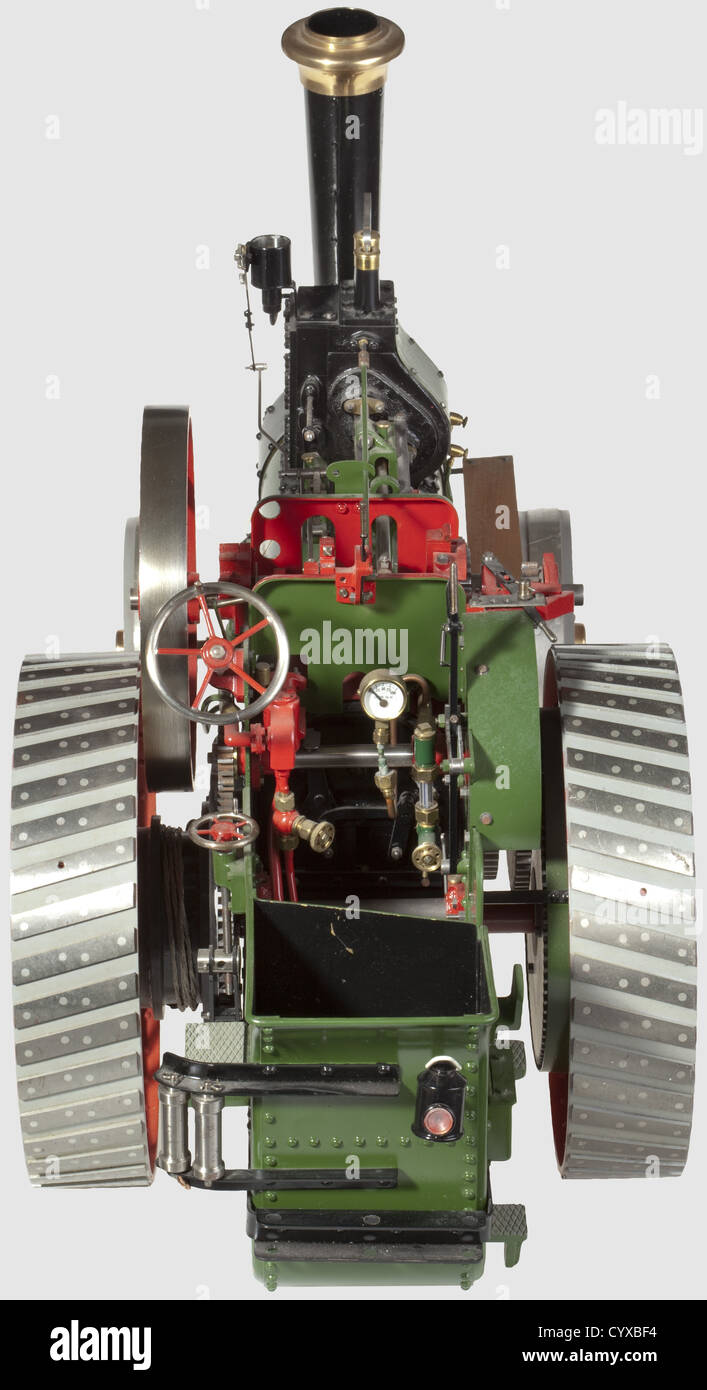 A well emgineered 1.5in scale model of a BURRELL 'DEVONSHIRE',single crank compound two speed three shaft general purpose traction engine. With braised copper boiler with normal fittings,two cylinders 0.5in and 7/8th in bores x 1.25in stroke,LP cylinder draincocks and pipes,mechanical lubricator,Stephenson's link reverse,eccentric driven feed pump and bypass,two road speeds and spoked flywheel. Chassis details include spoked,straked wheels,chain steering,damper,band brake to rear axle and many other details,finished in green,red and black with whit,Additional-Rights-Clearences-Not Available Stock Photo