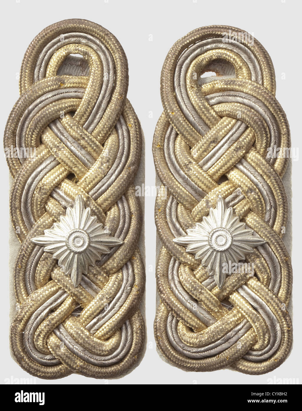 Pair of shoulder boards 'SS-Gruppenführer' and 'Generalleutnant',gold-silver-gold interwoven cords on mouse-grey wool underlay(heavy type),with rear loop,used,historic,historical,1930s,1930s,20th century,secret service,security service,secret services,security services,police,armed service,armed services,NS,National Socialism,Nazism,Third Reich,German Reich,Germany,utensil,piece of equipment,utensils,object,objects,stills,clipping,clippings,cut out,cut-out,cut-outs,fascism,fascistic,National Socialist,Nazi,Nazi period,unif,Additional-Rights-Clearences-Not Available Stock Photo