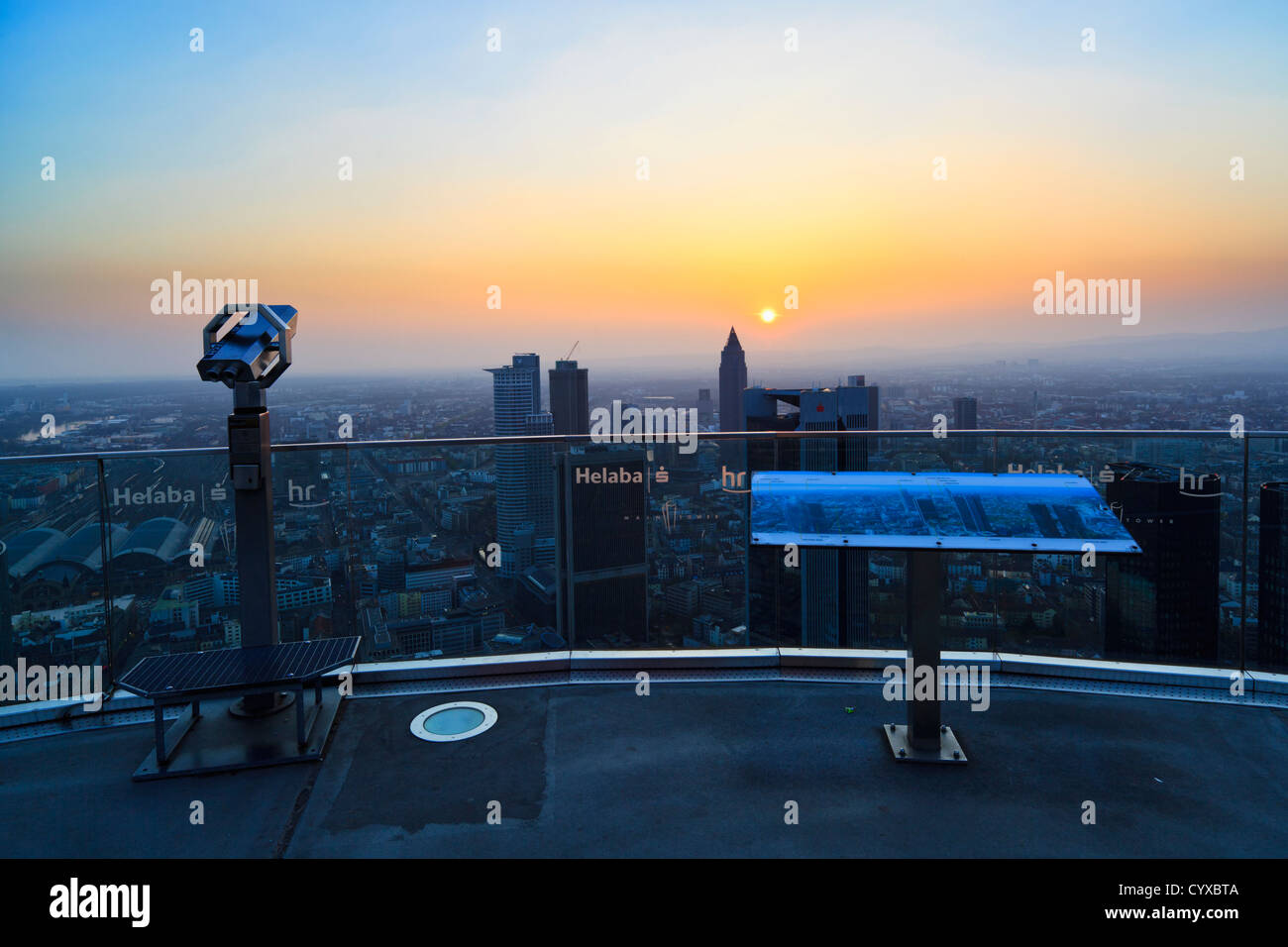 Germany, Frankfurt, View of town with telescope and map Stock Photo