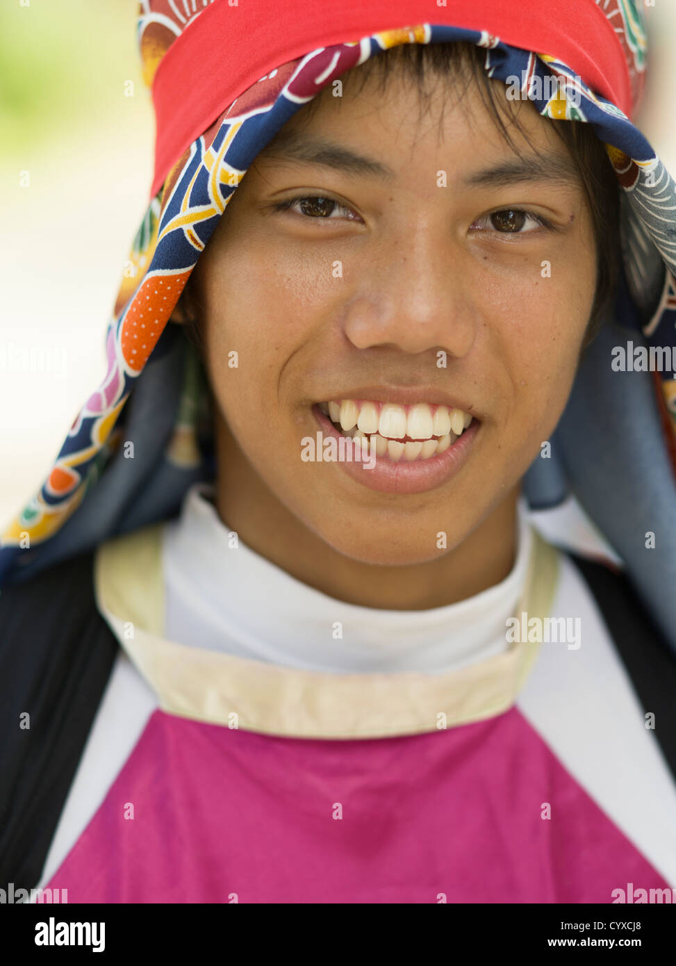 Young Okinawan man at Mushaama Harvest Festival Hateruma Island ...