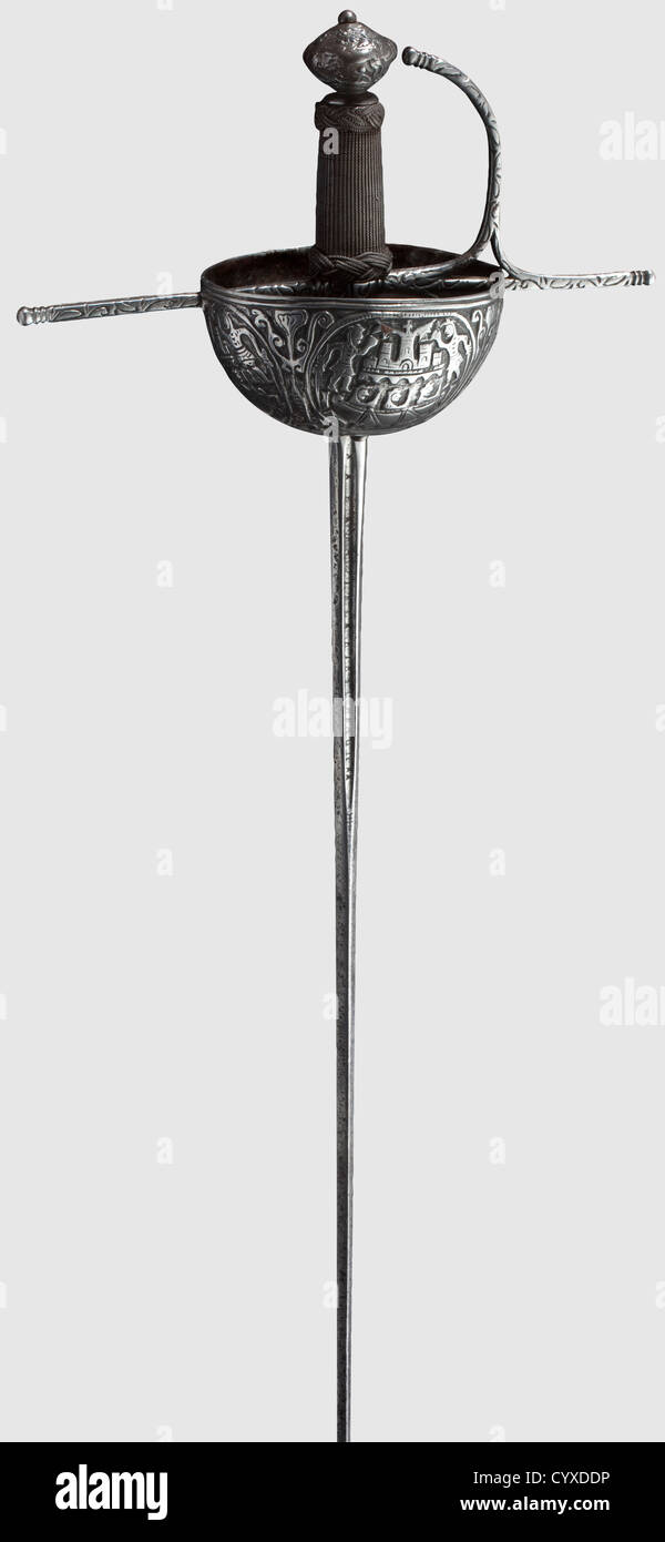 A Spanish colonial cup-hilt rapier,circa 1700 Slender thrusting blade with short fullers,the obverse fuller inscribed 'IN SOLINGEN'. Cut hilt,the cup elaborately ornamented with depictions of warriors. Unusual grip with fine wire binding and large Turk's heads. Cut pommel with small hemispherical rivet at top. Length 121 cm,historic,historical,18th century,weapons,arms,weapon,arm,baronial,military,militaria,rapier,rapiers,sword,swords,melee weapon,melee weapons,thrusting,thrustings,baton,object,objects,stills,clipping,cut out,cut-out,Additional-Rights-Clearences-Not Available Stock Photo