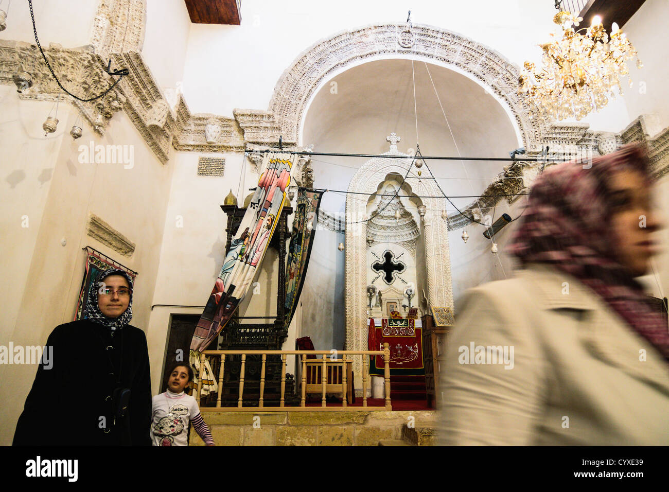 Turkish Muslim visitors at Deyr ul Zafaran Monastery, Mardin, Eastern Turkey Stock Photo