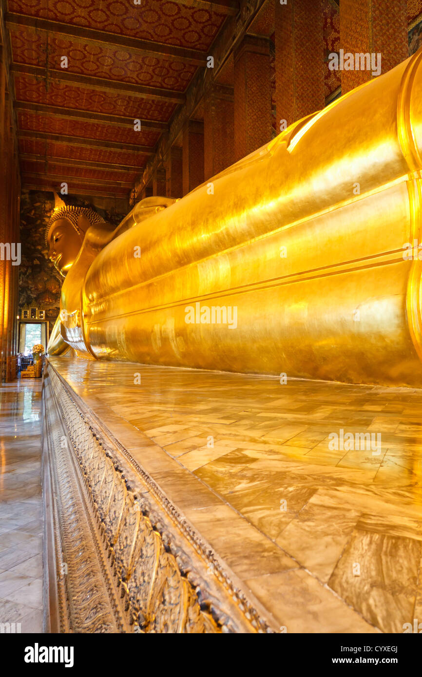 Reclining Buddha in the Temple Wat Pho in Bangkok, Thailand Stock Photo ...