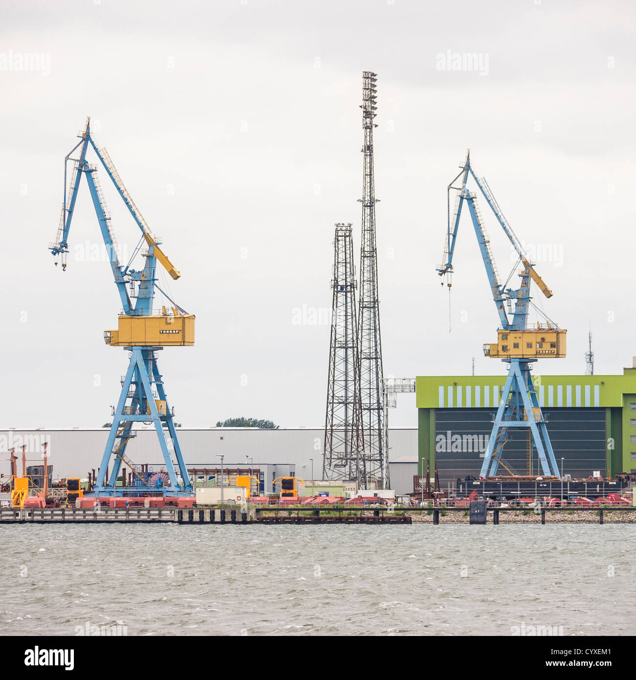 Northern Germany, View of loading docks with crane Stock Photo