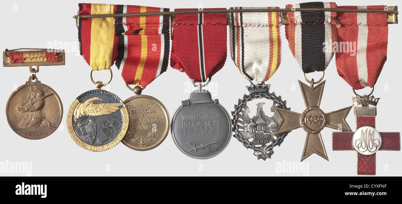 The Spanish Blue Division,the legacy of soldier Gutierrez del Castillo with letters A large five part medal bar with the following decorations: Spanish Military Service Cross,Red Division,Knightïs Cross 1st Class,War Service Cross 2nd Class without Swords,Spanish Commemorative Medal for members of the Blue Division,Eastern Winter Combat Medal,Commemorative Medal for Spanish volunteers in the Wehrmacht,and the Spanish Medalla de la Campana Espanola.The Spanish medal "1 Abril 1939 Victoria" is separate.It comes with the entire correspondence of voluntee,Additional-Rights-Clearences-Not Available Stock Photo