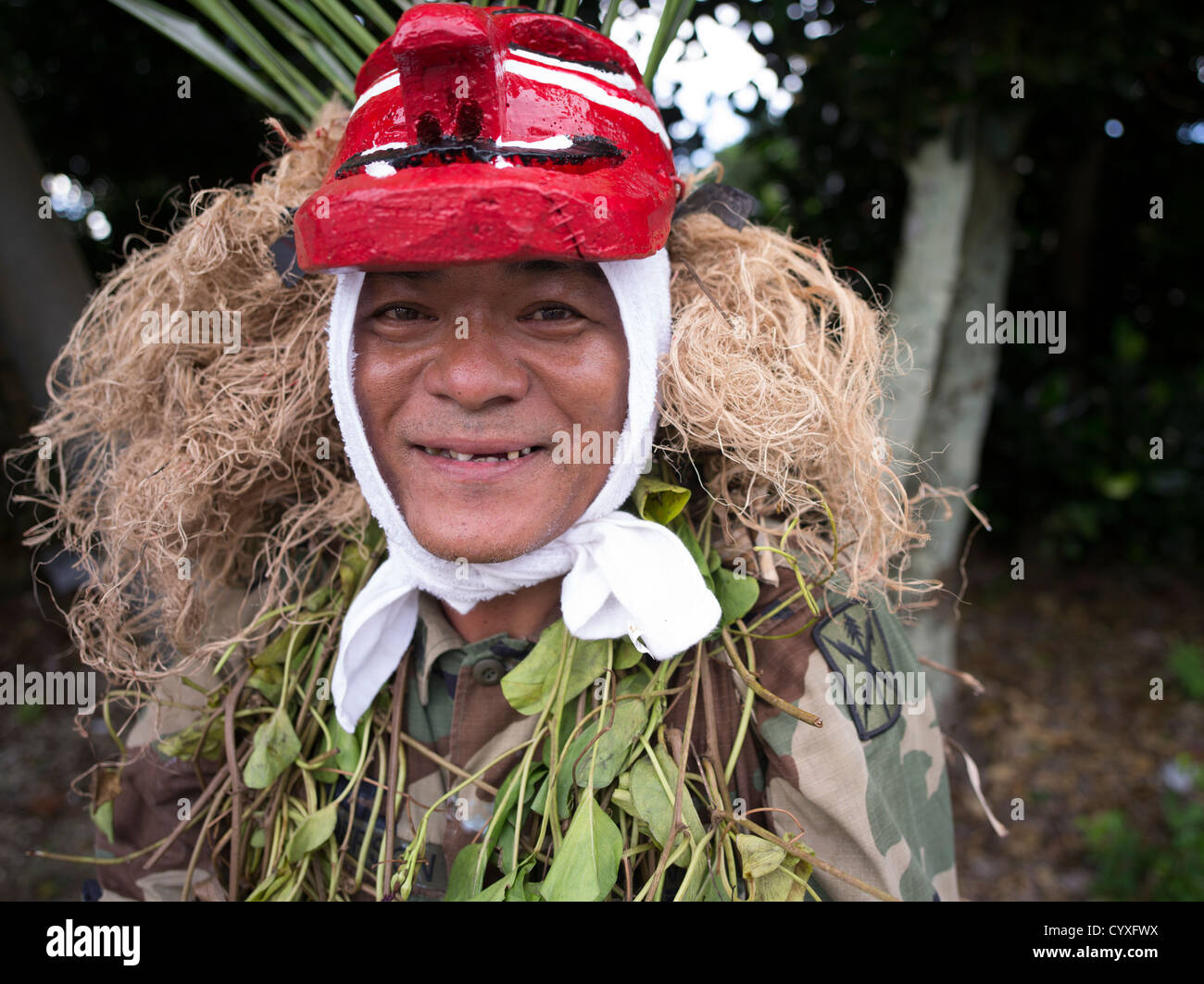 Okinawan Man with Fusamarah rain god mask, Mushaama Harvest Festival ...