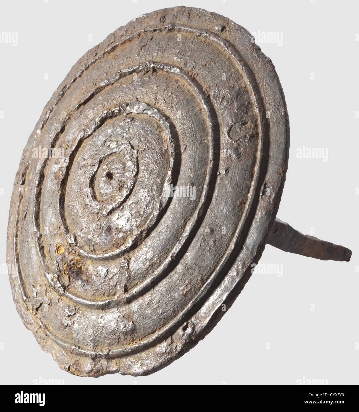 A ritual nail,Celtic,3rd / 2nd century B.C. Iron nail with a shank of diamond section and a wide head decorated with concentric circles. Diameter of head 11 cm. A nail which was to be driven into a holy object or a tree. The decoration is a reference to the centre of the world,which was seen as the Omphalos in Delphi in ancient Greece. Provenance: South German private collection,ca. 1970,historic,historical,ancient world,ancient world,ancient times,object,objects,stills,clipping,cut out,cut-out,cut-outs,mediterranean,precious metal,precious m,Additional-Rights-Clearences-Not Available Stock Photo