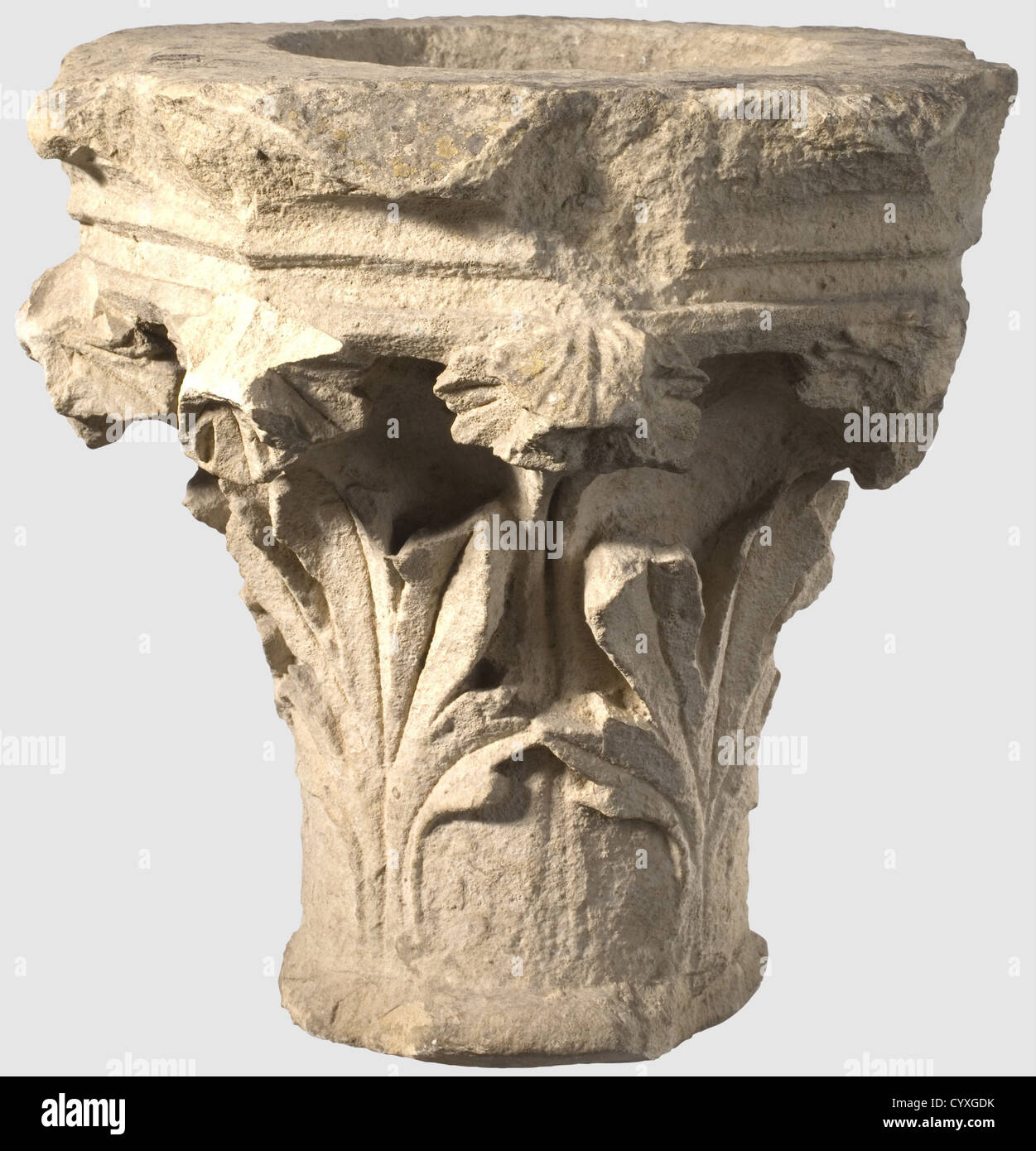 A French Gothic sandstone capital, 14th/15th century A light gray sandstone column capital in three-quarter relief. Surrounded by decorative acanthus with a stepped octagonal base and bowl-shaped top. Height 29 cm, historic, historical, 15th century, 14th century, handicrafts, handcraft, craft, object, objects, stills, clipping, clippings, cut out, cut-out, cut-outs, fine arts, art, artful, Additional-Rights-Clearences-Not Available Stock Photo