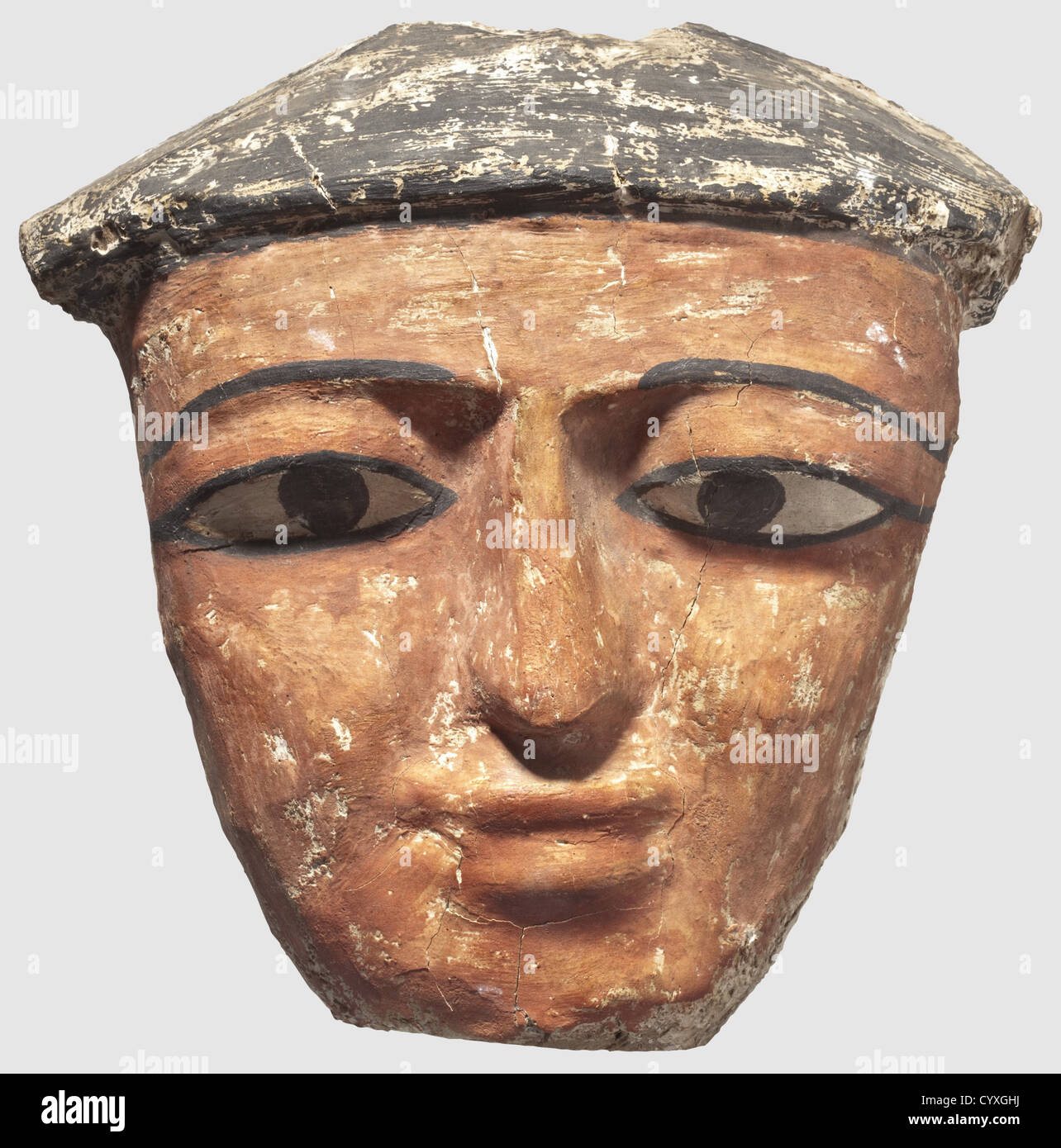 A face fragment from the lid of an Egyptian sarcophagus, Late Period, 7th - 1st century B.C. Wood with a plaster coating painted in colour. Broad male head with a black cowl. There are three dowel holes on the reverse side. Height 22.5 cm. Somewhat worn and minimal flaking. Provenance: Italian art dealer, historic, historical, ancient world, ancient world, ancient times, object, objects, stills, clipping, cut out, cut-out, cut-outs, mediterranean, precious metal, precious metals, Additional-Rights-Clearences-Not Available Stock Photo